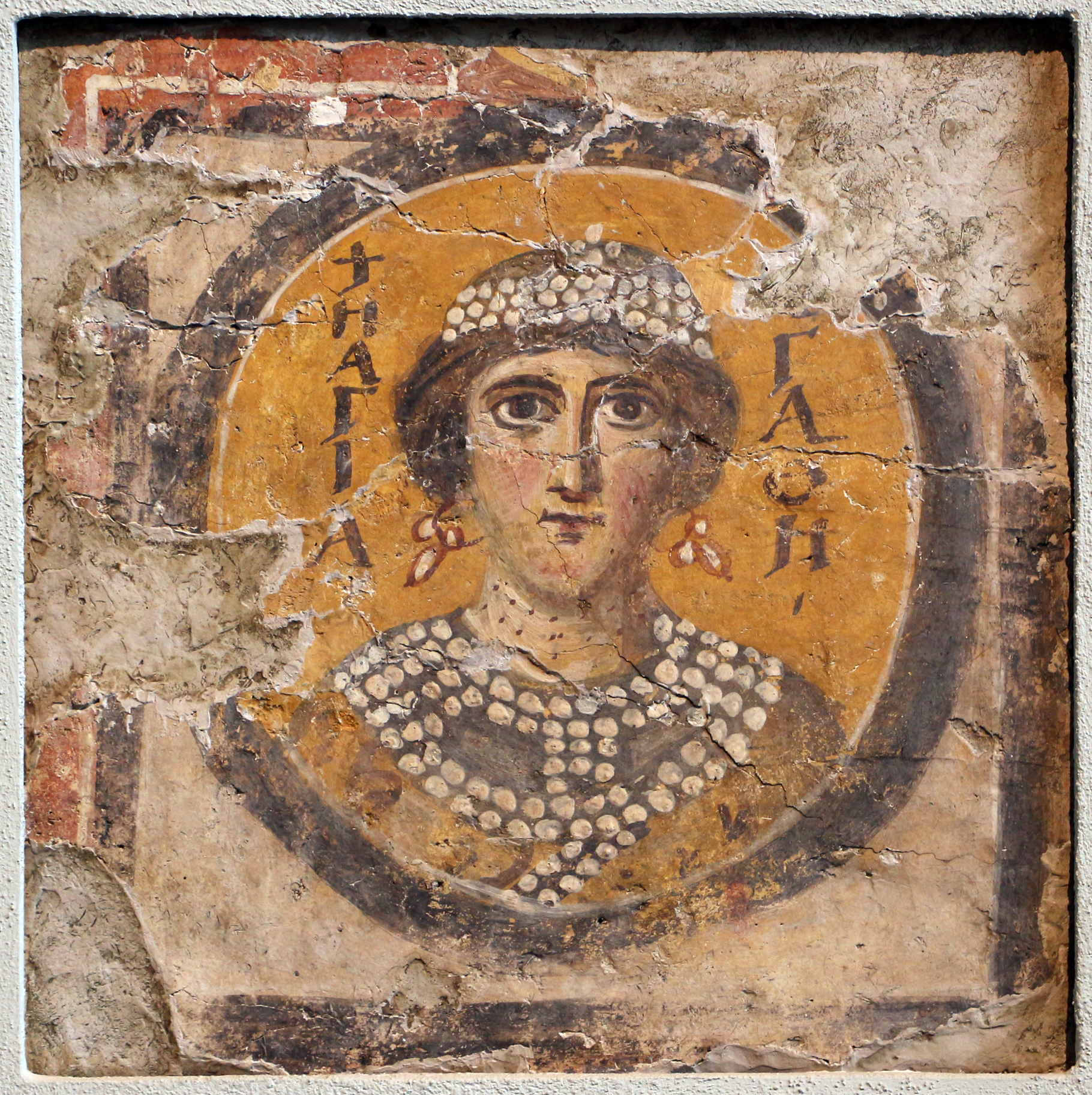 Illustrated portrait of Sainte Agathe de Sicile, with a soft halo