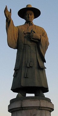Illustrated portrait of Sant'Andrea Kim Taegon, with a soft halo