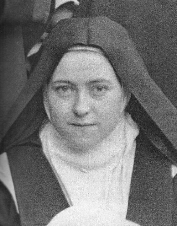 Illustrated portrait of Saint Thérèse of Lisieux, with a soft halo